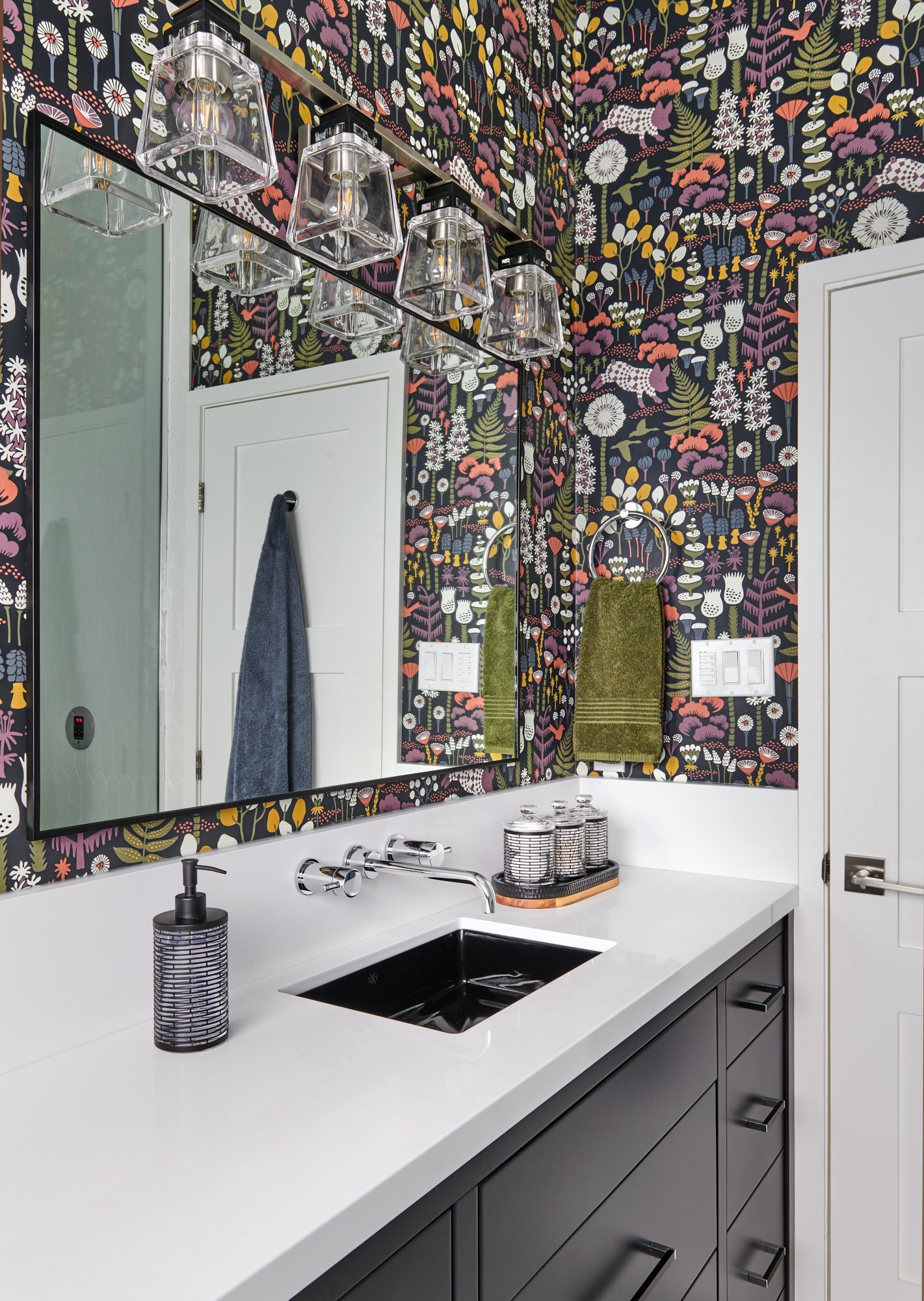 Copy of Gorgeous_renovated_bathroom_with_custom_vanity_in_All_Black_By_Farrow___Ball_White_Countertop_Black_Undermount_Sink_Chrome_Grohe_wall_mounted_hardware_Glass_vanity_lighting