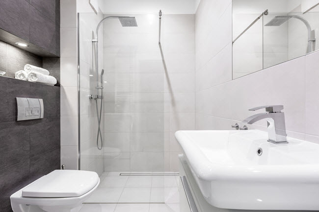 A Narrow Space Was Used To Create This Small Bathroom